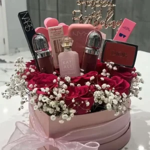 Luxury makeup gift box with roses and beauty products for birthday gift