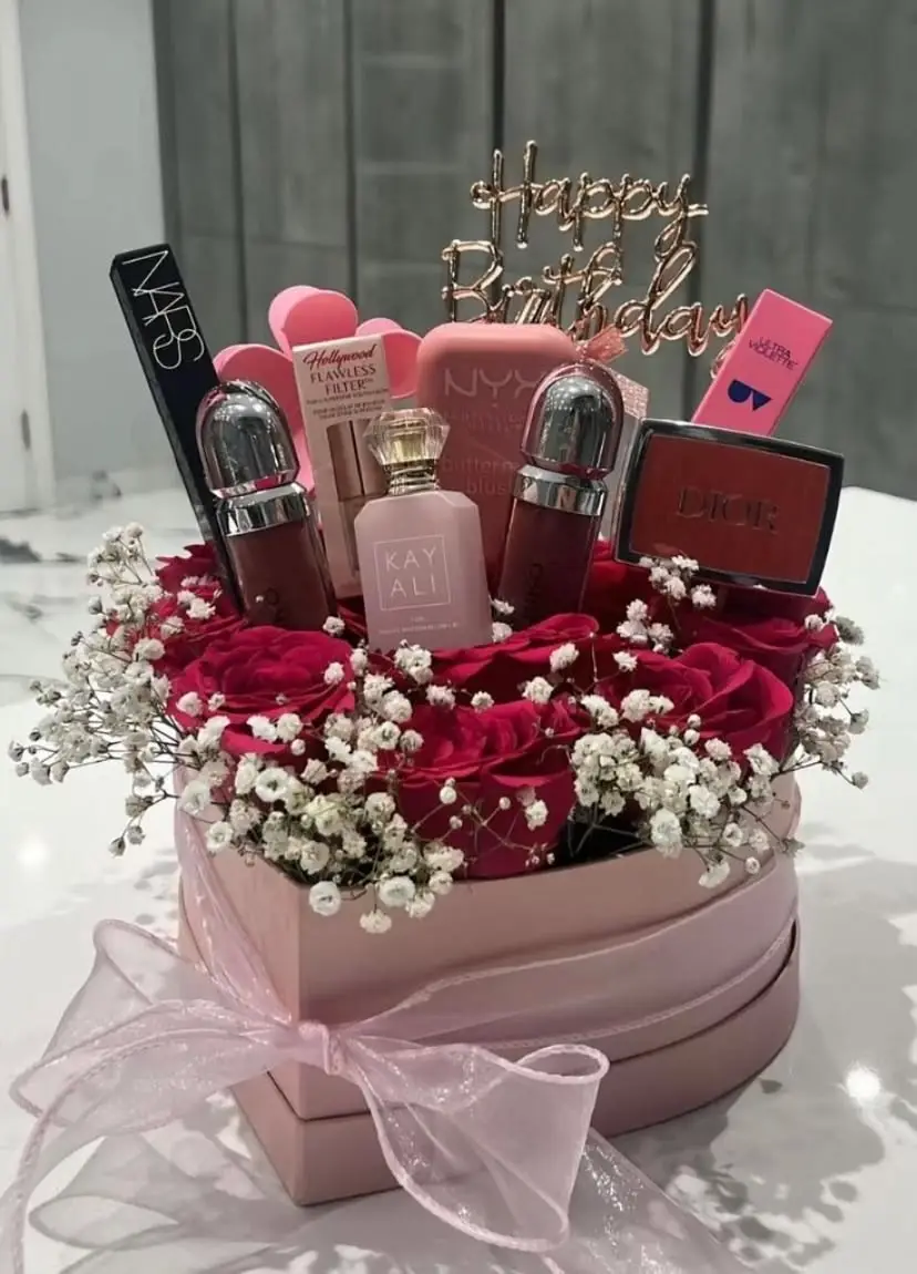 Luxury makeup gift box with roses and beauty products for birthday gift
